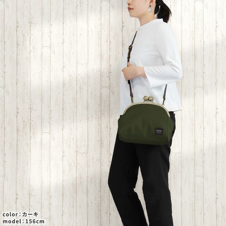 大玉がま口ポシェット【コーデュラ（R）】大きなひねりが付いたショルダーバッグ。